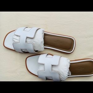Authentic Hermès Oran White Sandals - 38 women